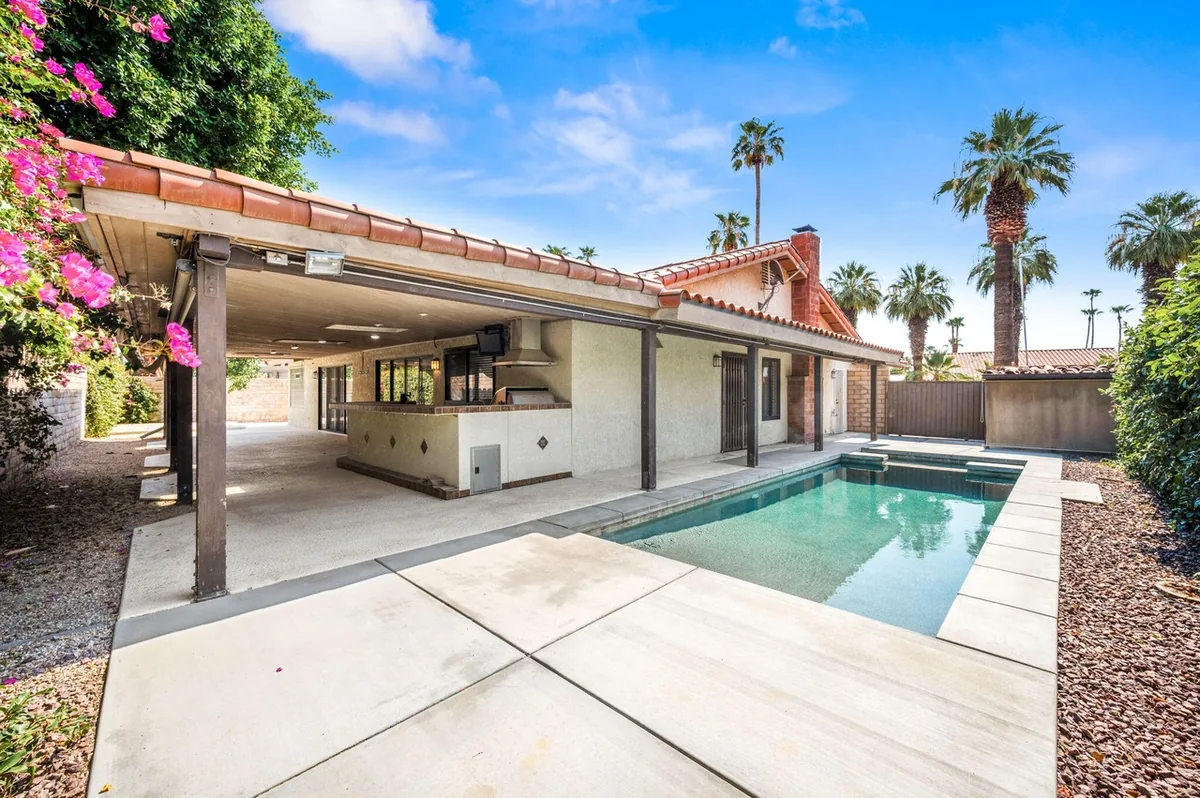Pool, covered patio and rear of the home at 35853 Canada Circle