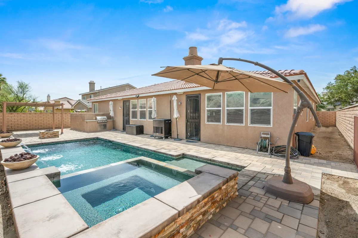 Pool, spa and rear of the home at 80572 Ullswater Drive